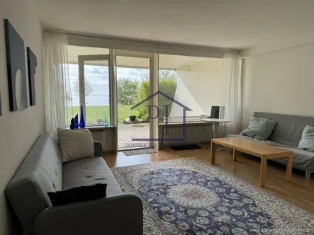 Wohnzimmer - Wohnung kaufen in Sierksdorf - Rarität: exklusive Terrassenwohnung mit Meerblick in Traumlage