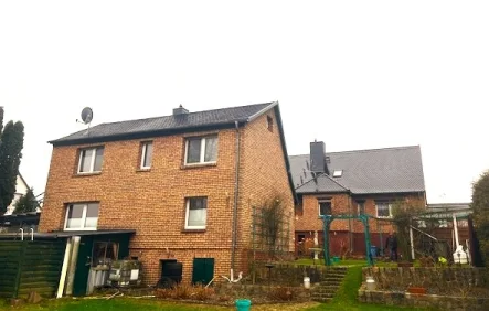 Ansicht   - Haus kaufen in Prohn - Ein Grundstück mit zwei Einfamilienhäusern in Prohn bei Stralsund zu verkaufen