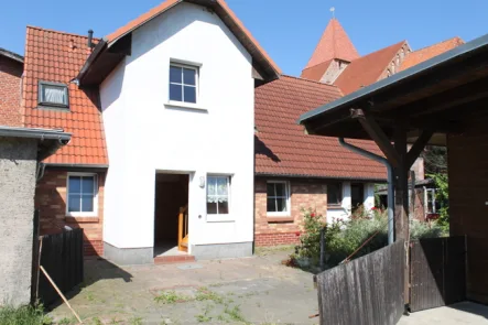 ehemalige Ansicht EFH 40a - Haus kaufen in Groß Mohrdorf - Sanierungsbedürftiges Einfamilienhaus mit Nebengelass und Grundstück in Groß Mohrdorf zu verkaufen