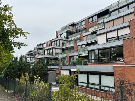 Ansicht - Wohnung kaufen in Ritterhude - Schöne Aussicht in Ritterhude! Tolle Eigentumswohnung im Terrassenhaus.