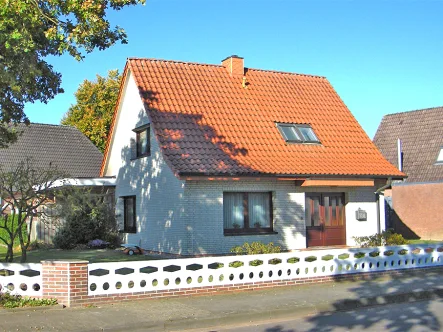 Eingangsansicht - Haus kaufen in Ganderkesee - Freistehendes Einfamilienhaus in bester Lage von Ganderkesee!