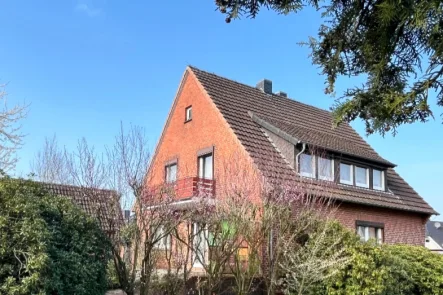 Verkauf Haus Stuhr-Seckenhausen Hechler & Twachtmann Immobilien GmbH - Haus kaufen in Stuhr - Stuhr-Seckenhausen – Haus mit zwei Wohneinheiten auf großem Grundstück!