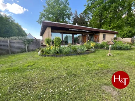 Verkauf Einfamilienhaus Bungalow Dünsen Hechler und Twachtmann Immobilien GmbH - Haus kaufen in Dünsen - Gemütlicher Bungalow in idyllischer Lage!