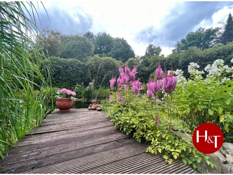 Ihre persönliche Wohlfühloase - Verkauf Nordwohlde Einfamilienhaus Villa Hechler und Twachtmann Immobilien GmbH - Haus kaufen in Bassum - Ein ganz besonderer Ort zum Wohlfühlen in ruhiger Lage in Nordwohlde!