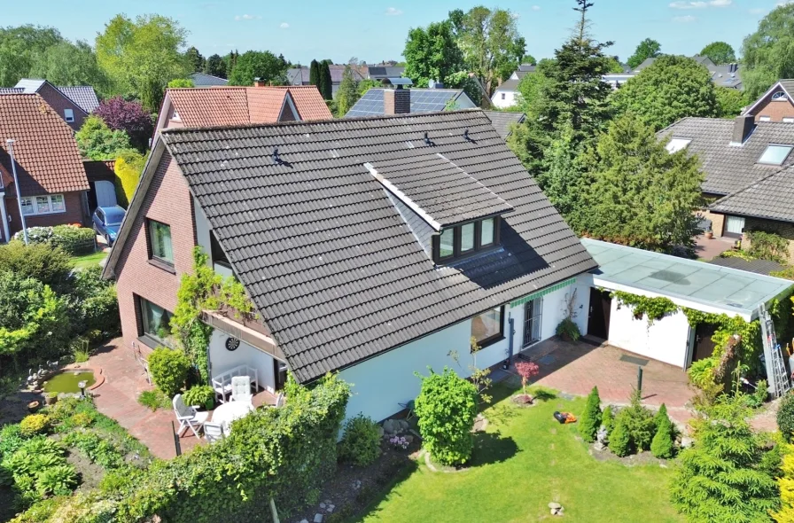 Verkauf Haus Weyhe-Erichshof Hechler & Twachtmann Immobilien GmbH - Haus kaufen in Weyhe - Wohnhaus für die junge Familie – in netter und ruhiger Umgebung