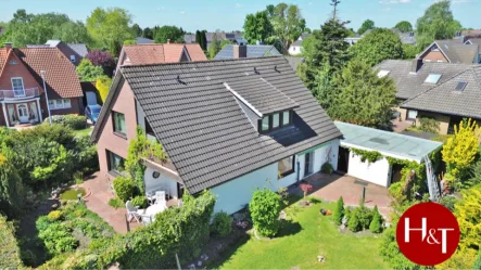 Verkauf Haus Weyhe-Erichshof Hechler & Twachtmann Immobilien GmbH - Haus kaufen in Weyhe - Wohnhaus für die junge Familie – in netter und ruhiger Umgebung