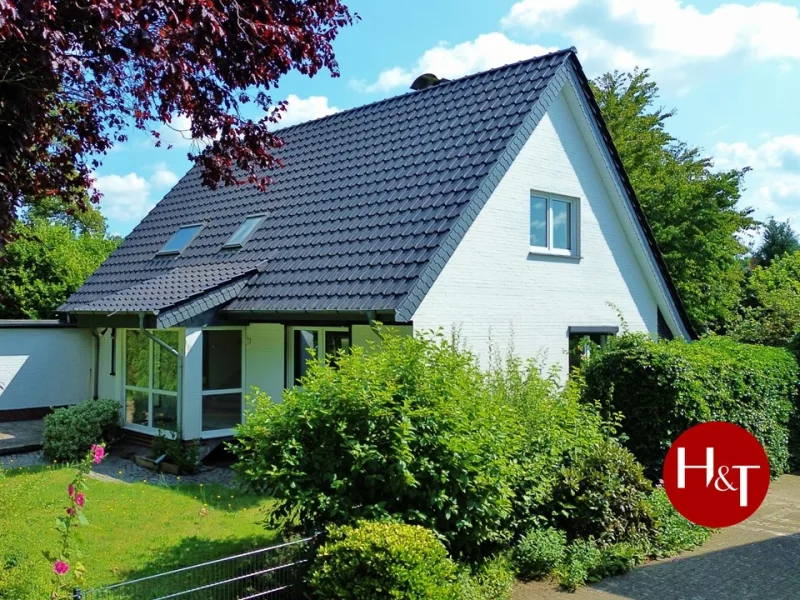 Verkauf Haus Stuhr-Varrel Hechler & Twachtmann Immobilien GmbH - Haus kaufen in Stuhr - Wohnen im Grünen, freistehendes Einfamilienhaus mit Garage