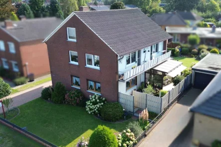 Verkauf Zweifamilienhaus Delmenhorst Hechler & Twachtmann Immobilien GmbH - Haus kaufen in Delmenhorst - Attraktives Zwei-Familien-Haus in Delmenhorst-Bungerhof!