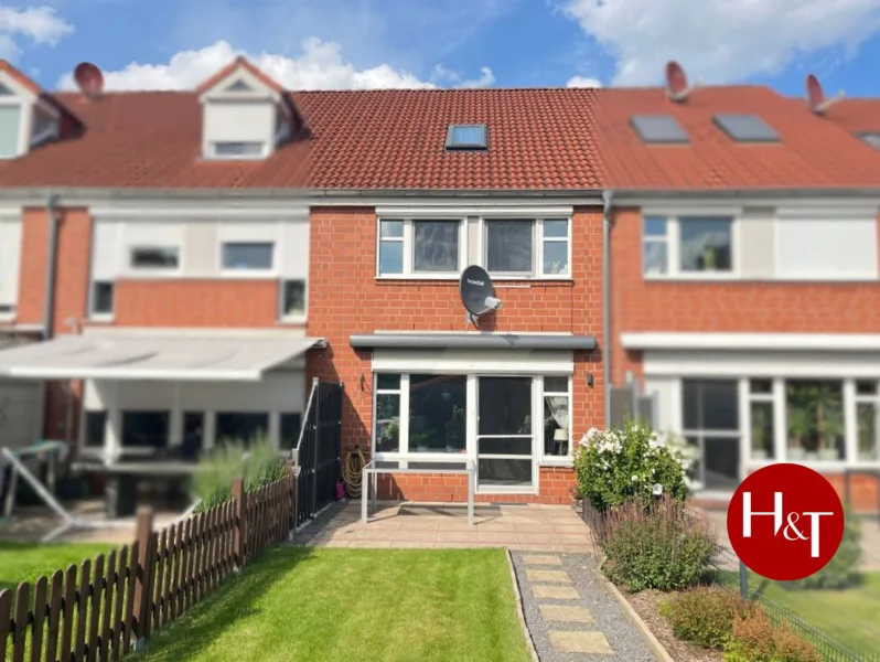 Verkauf Haus Stuhr-Moordeich Hechler & Twachtmann Immobilien GmbH - Haus kaufen in Stuhr - Stadtnahe Oase für die junge Familie!