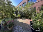 Terrasse hinter dem Haus zur eigenen Nutzung