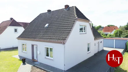 Verkauf Haus Stuhr-Brinkum Hechler  Twachtmann Immobilien GmbH - Haus kaufen in Stuhr - Freistehendes Einfamilienhaus mit großem Garten in Stuhr-Brinkum!