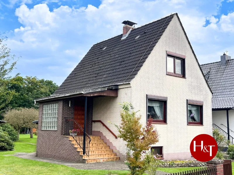 Haus kaufen in Bremen – H & T Immobilien GmbH - Haus kaufen in Bremen - Einfamilienhaus mit großem Grundstück und voller Potenzial!