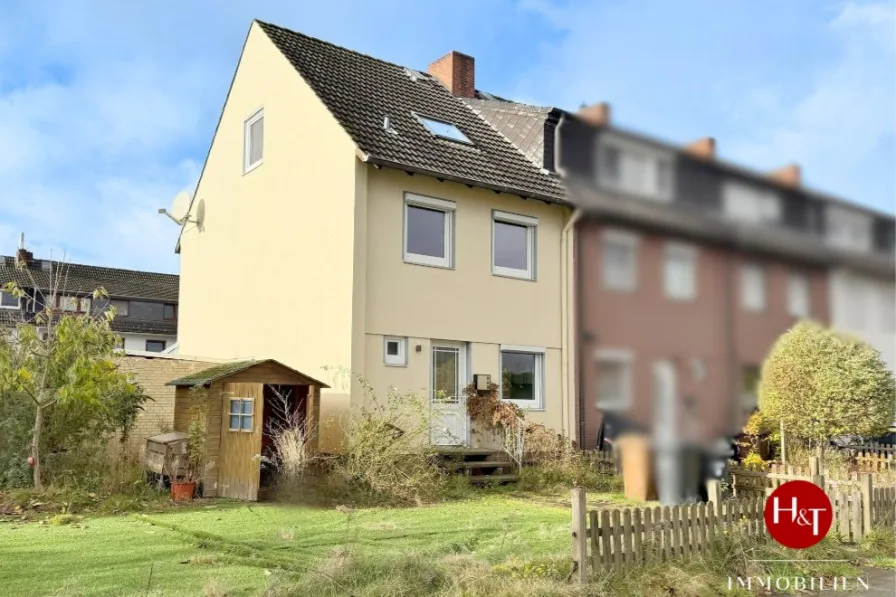 Verkauf Haus Stuhr-Brinkum Hechler & Twachtmann Immobilien GmbH - Haus kaufen in Stuhr - Reihenendhaus mit Vollkeller und Garage