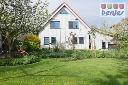 Energetisch top aufgestellt - Haus kaufen in Asendorf - Energetisch top aufgestelltes Familienwohnhaus aus Holz auf Naturidyll