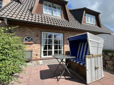 Terrasse - Wohnung kaufen in Sylt - Komfortable und genehmigte Ferienwohnung mit sonniger Terrasse in Keitum