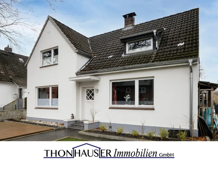 EFH-22850-Norderstedt-Thonhauser-Immobilien-GmbH-Titel - Haus kaufen in Norderstedt - Raumwunder! Einfamilienhaus (Teilvermietet bis 05.2025) mit Anbau in 22850 Norderstedt