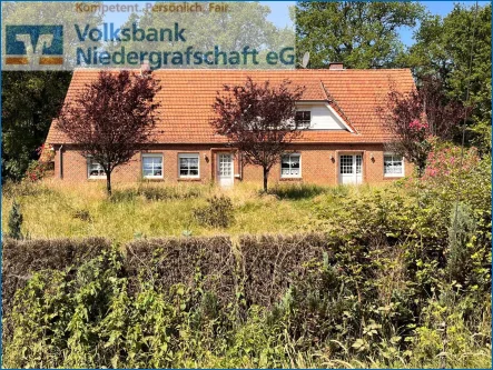 Vordere Ansicht - Haus kaufen in Georgsdorf - Resthof in schöner ländlicher Gegend