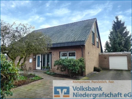 Vordere Ansicht - Haus kaufen in Georgsdorf - Attraktives Einfamilienhaus in Georgsdorf
