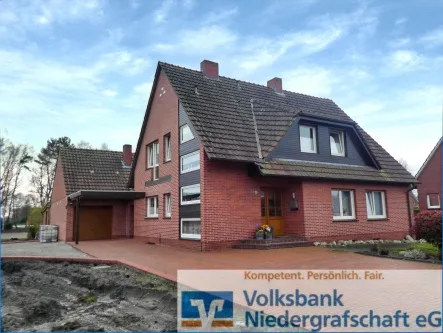 Vordere Ansicht - Haus kaufen in Georgsdorf - Familienfreundliches Wohnen 