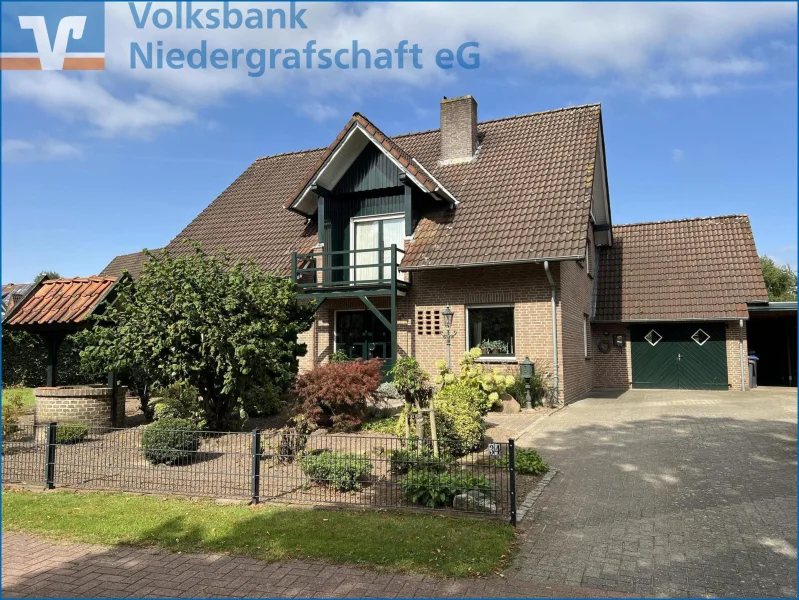 Straßenansicht - Haus kaufen in Uelsen - Modernes Wohnhaus in Uelsen