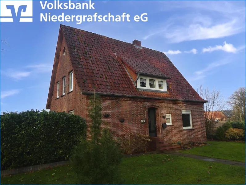 Straßenansicht - Haus kaufen in Getelo - Einfamilienhaus mit Garage in Getelo