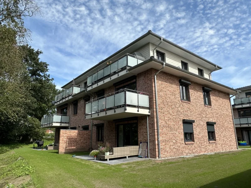 Rückansicht - Wohnung mieten in Moorrege - Schöne und neuwertige 3 Zimmer-Wohnung mit Balkon