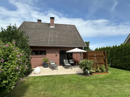 Hausansicht  - Haus kaufen in Seestermühe - Ein Blick ins Grüne - Einfamilienhaus mit zwei Terrassen in Seestermühe