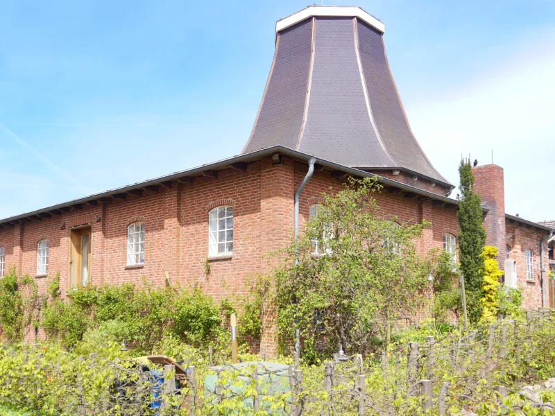 Seitliche Ansicht - Haus kaufen in Seestermühe - Ihr neues, individuelles Zuhause: Besonderes Wohnen in einer alten Windmühle!