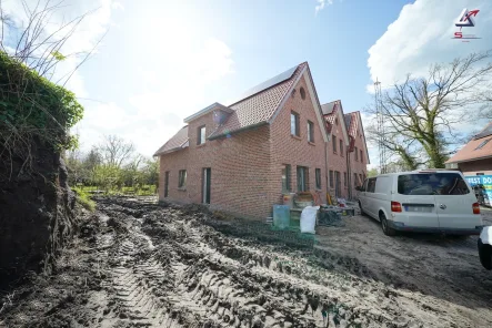 2784-lang1#schönes Reihenendhaus - Haus kaufen in Uplengen-Hollen - Energieeffizienter Neubau - Hochwertiges Reihenhaus in super Lage