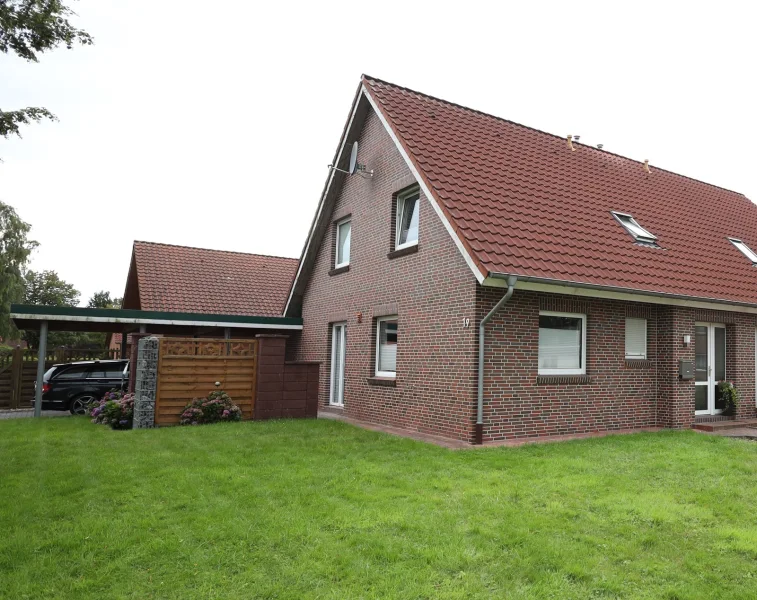 2829-kurz#linke DHH - Haus kaufen in Uplengen - Schöne Doppelhaushälfte in Remels