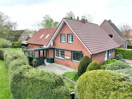 Terrassenansicht - Haus kaufen in Uplengen - Die besondere Immobilie zum Wohlfühlen!