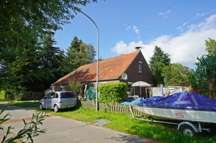 Ansicht - Haus kaufen in Detern - Zweifamilienhaus in Detern