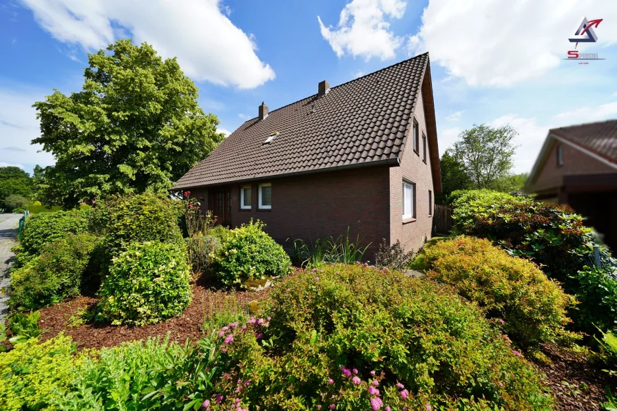 Seitenansicht - Haus mieten in Rhauderfehn - Tolles Einfamilienhaus in schöner Lage!