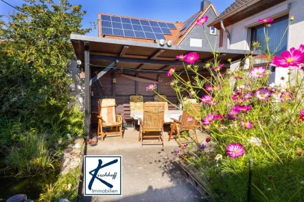 Terrasse - Haus kaufen in Liebenburg - Gemütliches Einfamilienhaus mit Kamin, großem Garten und geräumiger Garage in Liebenburg-Dörnten