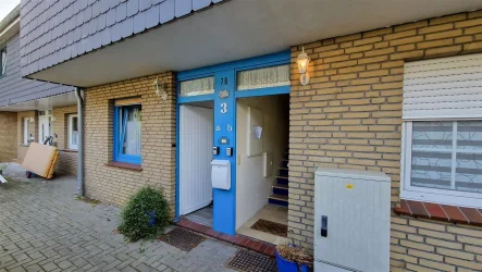 Hauseingang - Haus kaufen in Wangerland - 2 Ferienwohnungen in Reihenmittelhaus mit Garten und Balkon