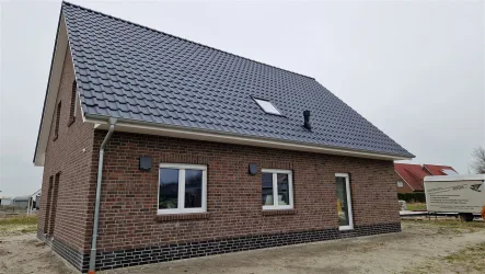 Ansicht - Wohnung mieten in Wangerland - Moderne Neubau-Dachgeschosswohnung in Hohenkirchen
