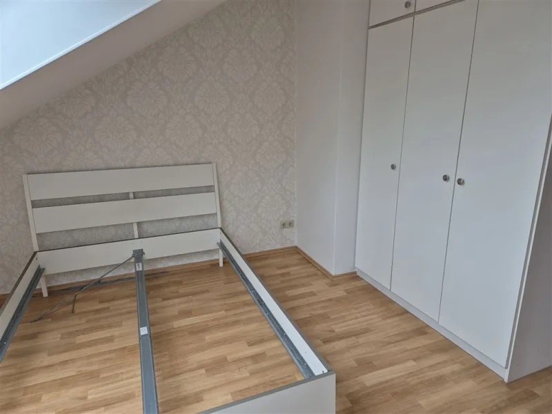 Schlafzimmer mit Einbauschrank