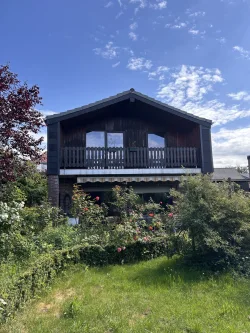 Titelbild - Haus kaufen in Wardenburg - Handwerker aufgepasst: Einfamilienhaus in Wardenburg zu verkaufen!