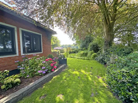 Seitenansicht - Haus kaufen in Wardenburg / Hundsmühlen - Traumhafte Einzellage in Hundsmühlen