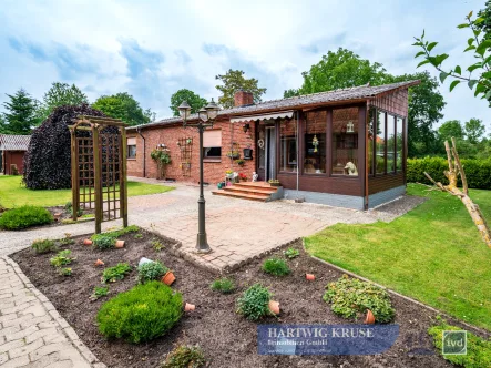  - Haus kaufen in Oederquart - kleines Einfamilienhaus mit Nebengebäude, Terrasse und Wintergarten