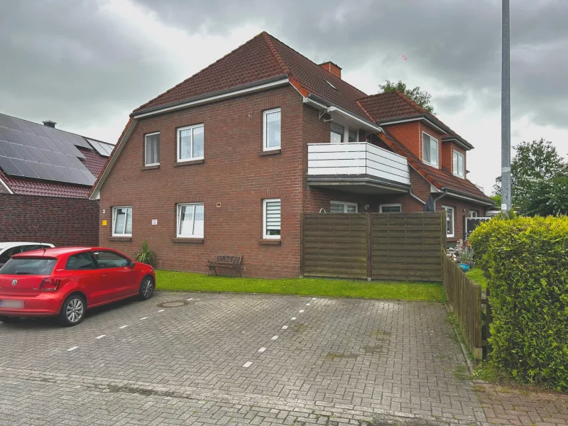 Außenansicht - Wohnung mieten in Wittmund - Erdgeschosswohnung im Inselviertel von Wittmund mit Garten und Terrasse