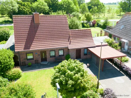 Außenansicht - Haus kaufen in Wöhrden - Gemütliches Einfamilienhaus mit ca. 123 m² Wohnfläche in ruhiger Sackgassenlage unweit Büsums zu verkaufen