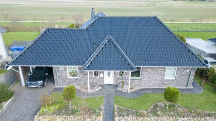 Außenansicht - Haus kaufen in Büsum - Energieeffizienter Bungalow mit ca. 134 m² Wohnfläche im Nordseeheilbad Büsum zu verkaufen