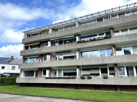 Gebäude Rückseite - Wohnung kaufen in Bad Bramstedt - Sonnige Eigentumswohnung in Bad Bramstedt - vermietet 