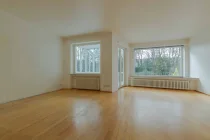 Hochparterre Wohnzimmer mit Wintergarten