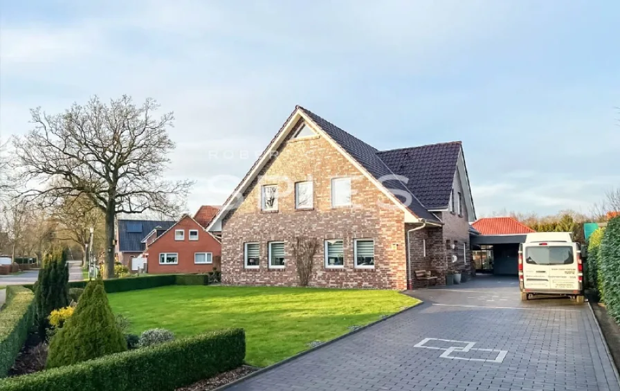 24874-online1_ - Haus kaufen in Uplengen - Tolles Einfamilienhaus mit Einliegerwohnung und Doppelcarport in beliebter und ruhiger Wohnlage