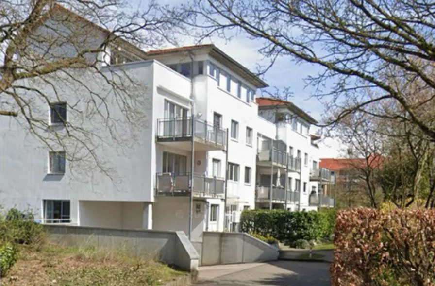 Fronetansicht - Wohnung kaufen in Norderstedt - Helle und gepflegte 4-Zimmer Wohnung mit Tiefgaragenstellplatz