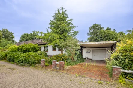 Hausansicht Vorne - Haus kaufen in Berne - Traumhafte Lage!Gepflegter Bungalow auf großem Wassergrundstück