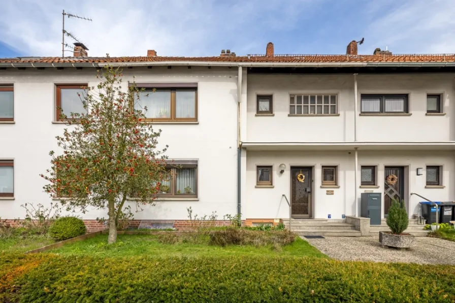 Vorderansicht (1) - Haus kaufen in Bremen - Reihenmittelhaus mit zwei Wohneinheiten in ruhigen und dennoch zentraler Lage in Bremen-Nord