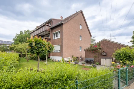 Hausansicht - Wohnung kaufen in Bremen - Großzügig geschnittene, gepflegte Eigentumswohnung mit Balkon und Garage in Bremen- Nord